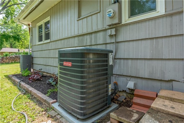 1112 Anderson St, Warrensburg, MO 64093 - exterior view of a central AC unit and electric meter