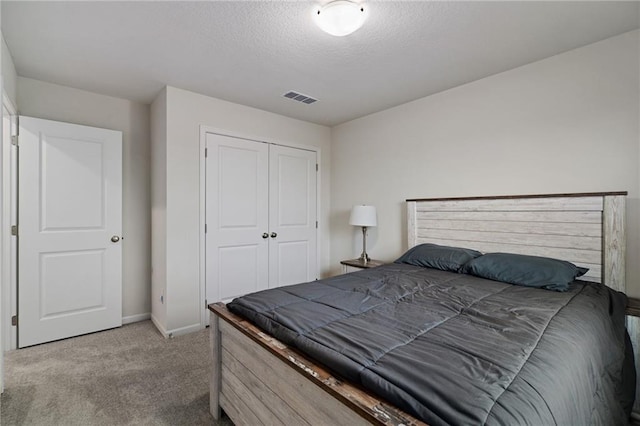 24840 W 178th Ct, Gardner, KS 66030 - bedroom with carpet floors, a closet, and a textured ceiling