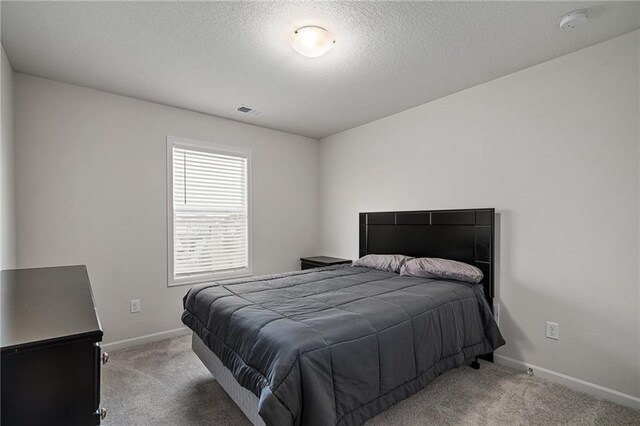 24840 W 178th Ct, Gardner, KS 66030 - carpeted bedroom with baseboards and a textured ceiling