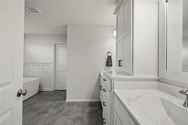 24840 W 178th Ct, Gardner, KS 66030 - bathroom with a freestanding tub and vanity