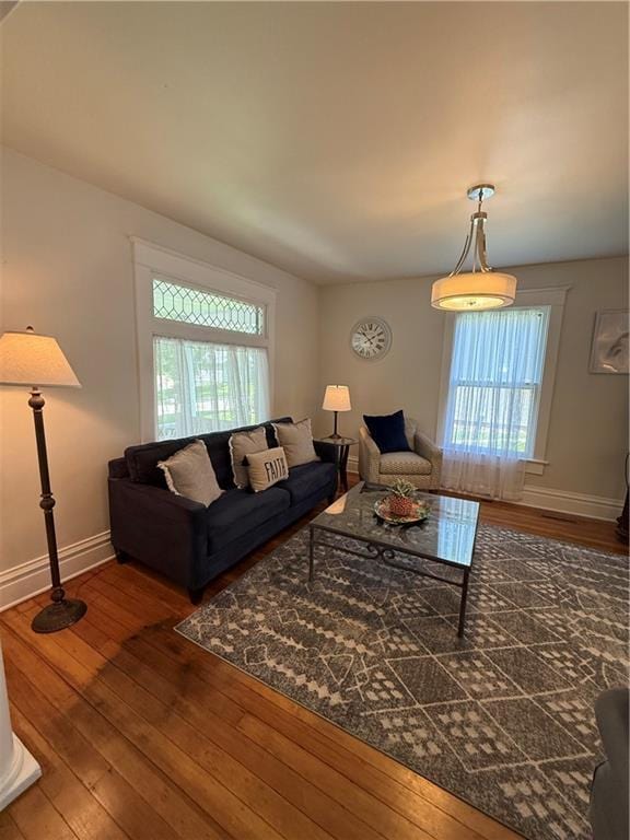 928 S 6th St, Atchison, KS 66002 - living area featuring healthy amount of natural light and hardwood / wood-style floors