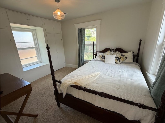 928 S 6th St, Atchison, KS 66002 - bedroom featuring light colored carpet and baseboards