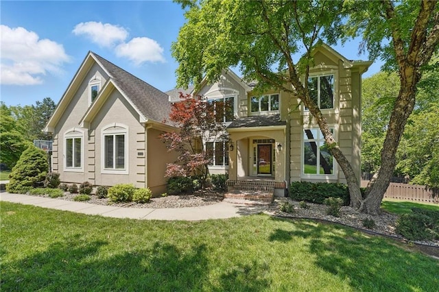 15340 Knox St, Overland Park, KS 66221 - traditional-style home with stucco siding and roof with shingles
