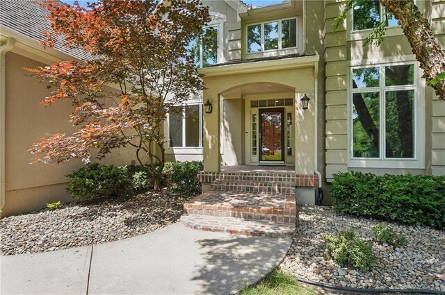 15340 Knox St, Overland Park, KS 66221 - doorway to property featuring stucco siding