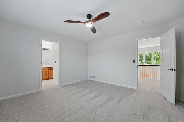 15340 Knox St, Overland Park, KS 66221 - empty room featuring a ceiling fan and light carpet
