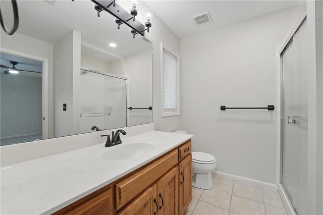 15340 Knox St, Overland Park, KS 66221 - bathroom featuring vanity, a stall shower, and tile patterned flooring