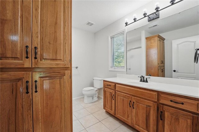 15340 Knox St, Overland Park, KS 66221 - bathroom with vanity, tile patterned floors, and a shower