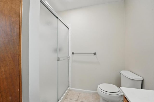 15340 Knox St, Overland Park, KS 66221 - bathroom with a stall shower, tile patterned floors, and vanity