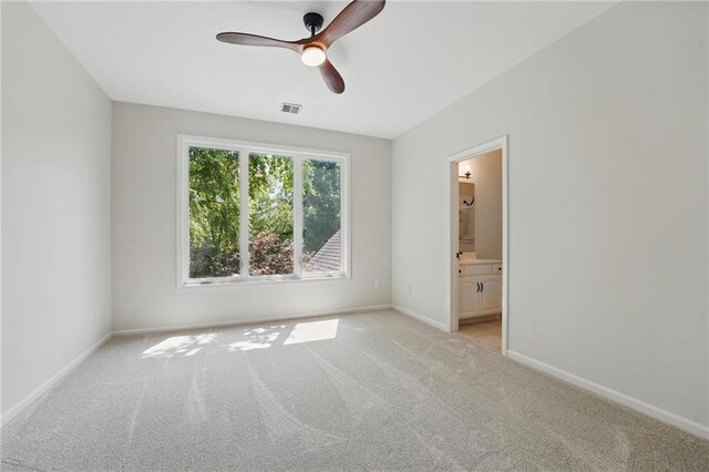 15340 Knox St, Overland Park, KS 66221 - unfurnished room with light carpet and a ceiling fan
