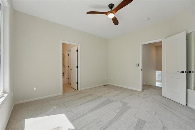 15340 Knox St, Overland Park, KS 66221 - unfurnished bedroom with light carpet, ensuite bathroom, and ceiling fan