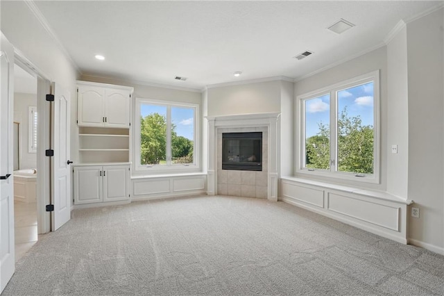 15340 Knox St, Overland Park, KS 66221 - unfurnished living room featuring ornamental molding, light carpet, a fireplace, and recessed lighting