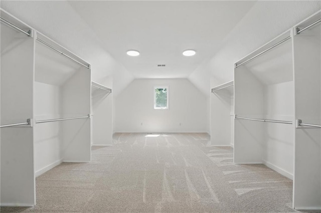 15340 Knox St, Overland Park, KS 66221 - walk in closet featuring vaulted ceiling and carpet
