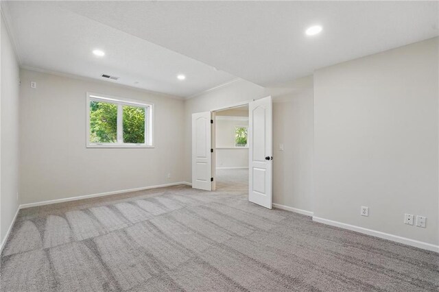 15340 Knox St, Overland Park, KS 66221 - carpeted spare room featuring recessed lighting and crown molding