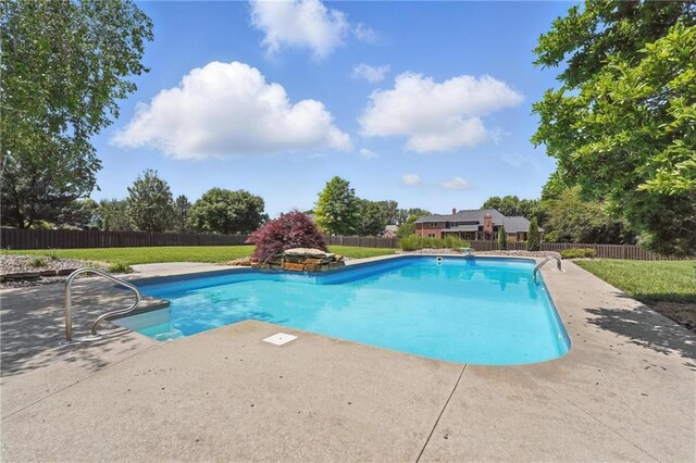 15340 Knox St, Overland Park, KS 66221 - view of swimming pool with a patio area