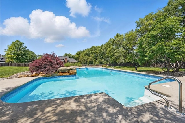 15340 Knox St, Overland Park, KS 66221 - outdoor pool with a fenced backyard, a diving board, and view of scattered trees