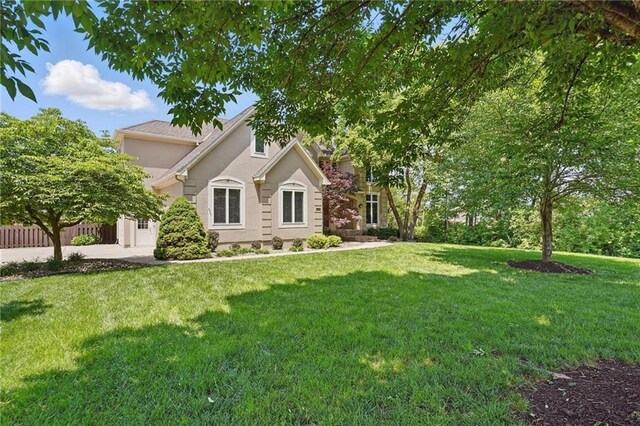 15340 Knox St, Overland Park, KS 66221 - obstructed view of property featuring stucco siding