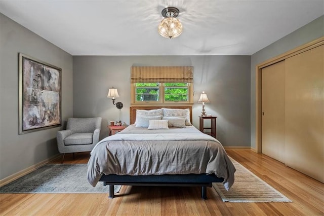 3514 W 47th Pl, Roeland Park, KS 66205 - bedroom with wood finished floors and a closet