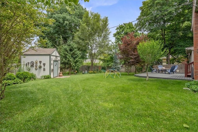 3514 W 47th Pl, Roeland Park, KS 66205 - fenced backyard with a deck and a storage shed