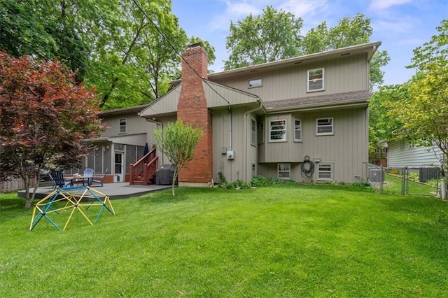 3514 W 47th Pl, Roeland Park, KS 66205 - rear view of house featuring a chimney, a patio area, and a gate