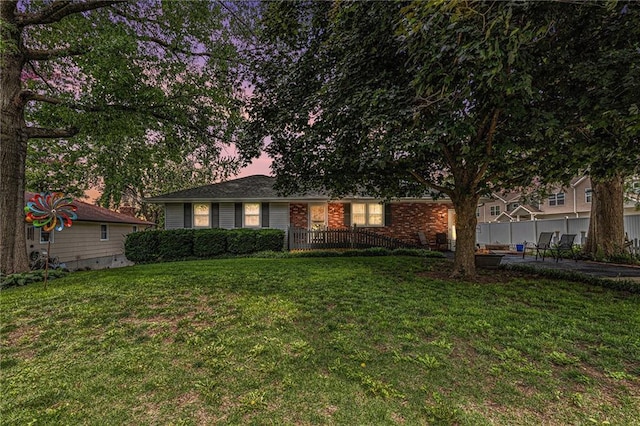 308 E Meadow St, Smithville, MO 64089 - view of front of home with a yard and a patio area
