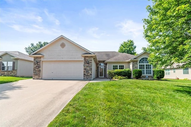 1111 SW 13th St, Oak Grove, MO 64075 - ranch-style home featuring an attached garage, concrete driveway, a front lawn, and stone siding