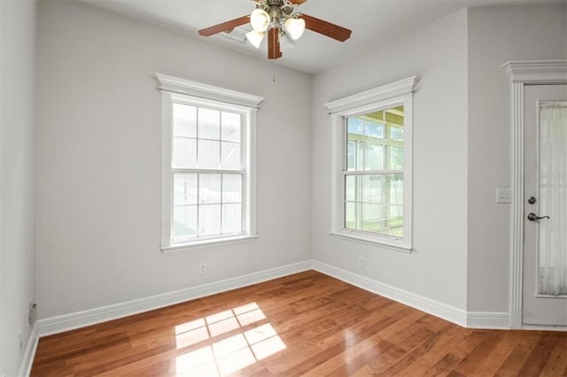 1111 SW 13th St, Oak Grove, MO 64075 - unfurnished room featuring wood finished floors and ceiling fan