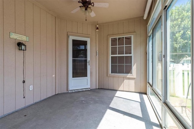 1111 SW 13th St, Oak Grove, MO 64075 - unfurnished sunroom featuring ceiling fan