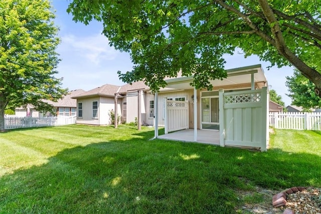 1111 SW 13th St, Oak Grove, MO 64075 - back of house featuring a patio area