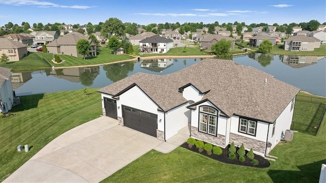 1104 SW Magnolia Cir, Oak Grove, MO 64075 - aerial view of residential area with a large body of water