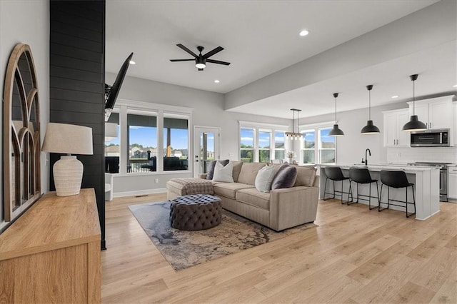 1104 SW Magnolia Cir, Oak Grove, MO 64075 - living area featuring recessed lighting, light wood-style floors, and a ceiling fan