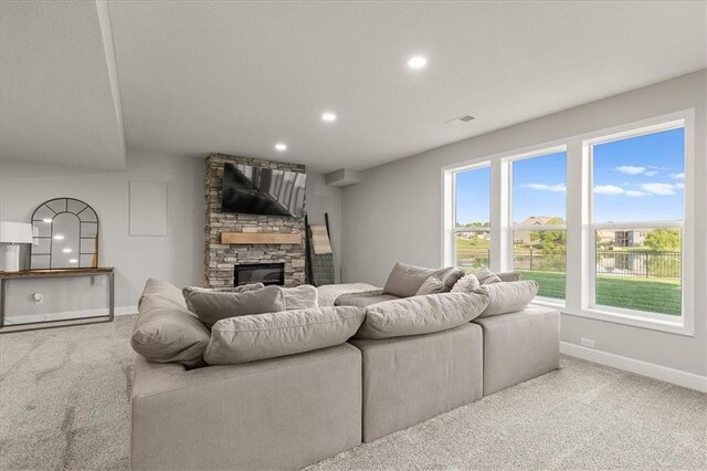 1104 SW Magnolia Cir, Oak Grove, MO 64075 - carpeted living area with a fireplace and recessed lighting