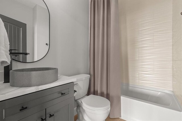 1104 SW Magnolia Cir, Oak Grove, MO 64075 - full bathroom featuring vanity and shower / bathtub combination with curtain