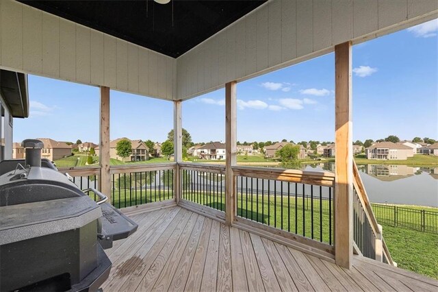 1104 SW Magnolia Cir, Oak Grove, MO 64075 - wooden terrace featuring a residential view and a water view