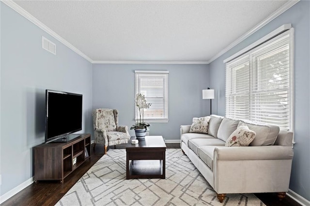 5011 Briar St, Roeland Park, KS 66205 - living room with ornamental molding, wood finished floors, and a textured ceiling