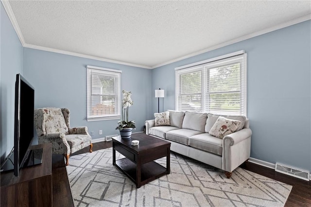 5011 Briar St, Roeland Park, KS 66205 - living area with a textured ceiling, crown molding, and wood finished floors