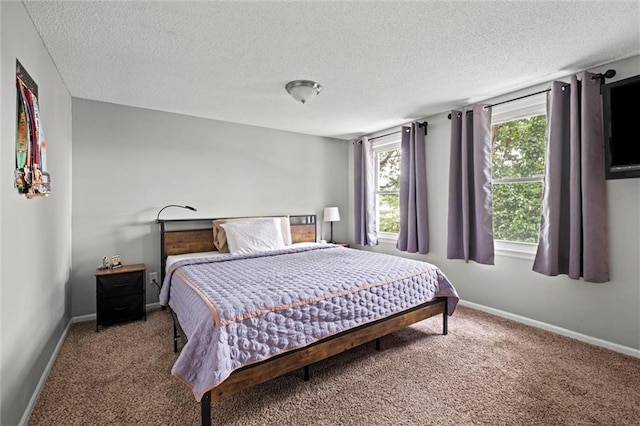 5011 Briar St, Roeland Park, KS 66205 - carpeted bedroom with a textured ceiling and baseboards