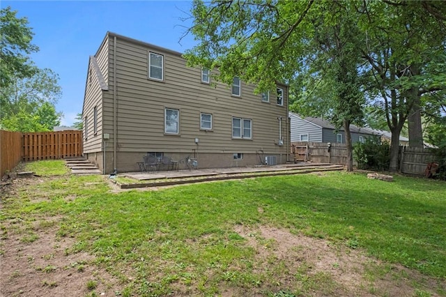 5011 Briar St, Roeland Park, KS 66205 - rear view of property with a fenced backyard