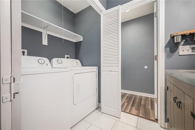 815 Pawnee St, Leavenworth, KS 66048 - washroom featuring independent washer and dryer and light tile patterned flooring