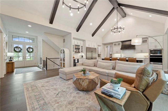 11807 S Kenton St, Olathe, KS 66061 - living area with a chandelier, high vaulted ceiling, beam ceiling, wood finished floors, and french doors
