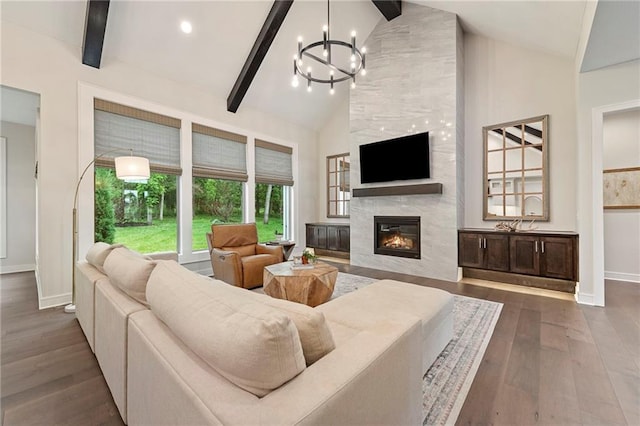 11807 S Kenton St, Olathe, KS 66061 - living room with dark wood-style flooring, high vaulted ceiling, a tiled fireplace, beam ceiling, and a chandelier