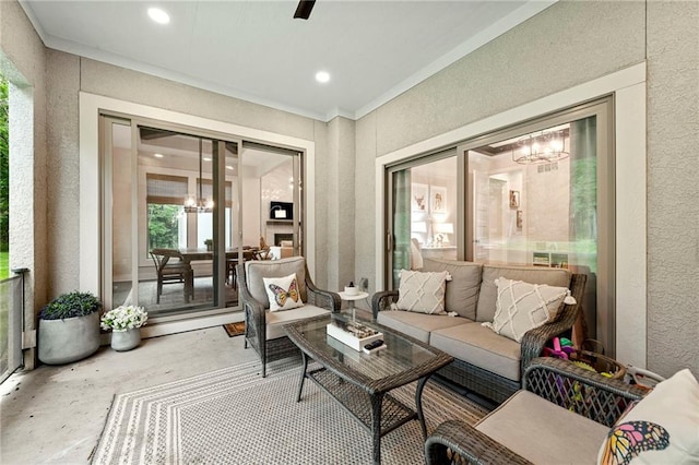 11807 S Kenton St, Olathe, KS 66061 - living area featuring a textured wall, a chandelier, and recessed lighting