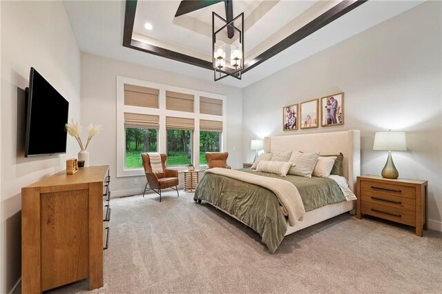 11807 S Kenton St, Olathe, KS 66061 - bedroom featuring light carpet, a chandelier, and a raised ceiling