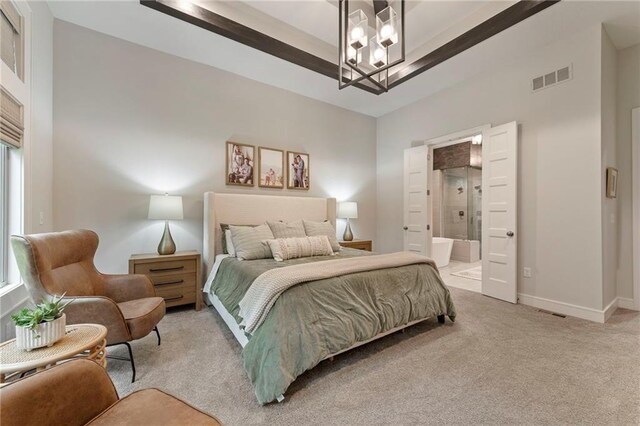 11807 S Kenton St, Olathe, KS 66061 - bedroom with carpet flooring, a chandelier, and connected bathroom
