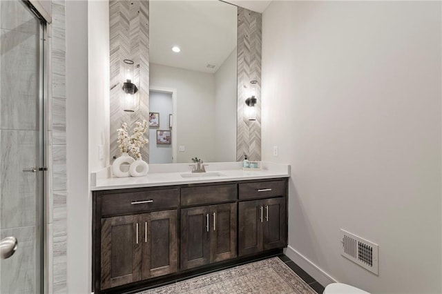 11807 S Kenton St, Olathe, KS 66061 - full bathroom featuring vanity, a shower with shower door, and recessed lighting