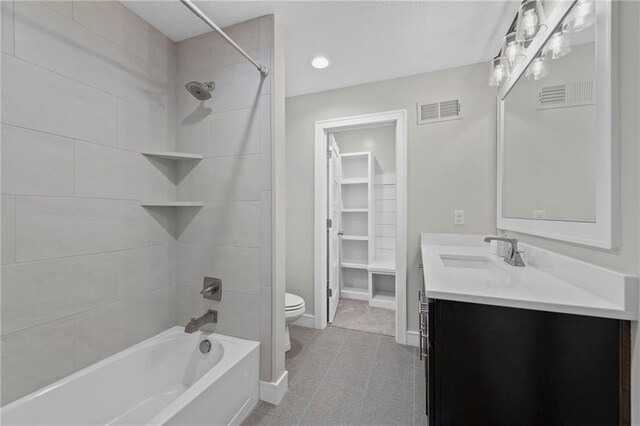 11807 S Kenton St, Olathe, KS 66061 - bathroom with vanity, bathing tub / shower combination, tile patterned floors, and recessed lighting