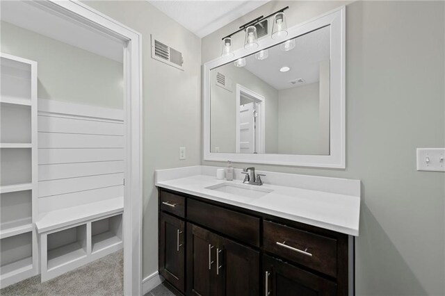 11807 S Kenton St, Olathe, KS 66061 - bathroom with vanity and baseboards