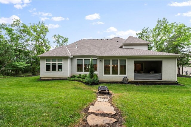 11807 S Kenton St, Olathe, KS 66061 - back of house with a lawn and stucco siding