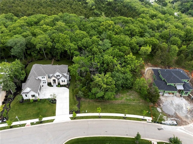11807 S Kenton St, Olathe, KS 66061 - aerial view of property and surrounding area with a heavily wooded area