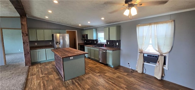 2251 Nemaha Rd, Cummings, KS 66016 - kitchen featuring stainless steel appliances, ornamental molding, dark wood-style floors, butcher block counters, and green cabinetry