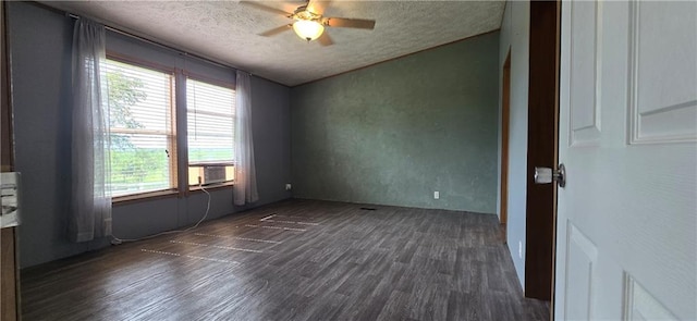 2251 Nemaha Rd, Cummings, KS 66016 - empty room with dark wood finished floors, a textured ceiling, ceiling fan, and vaulted ceiling